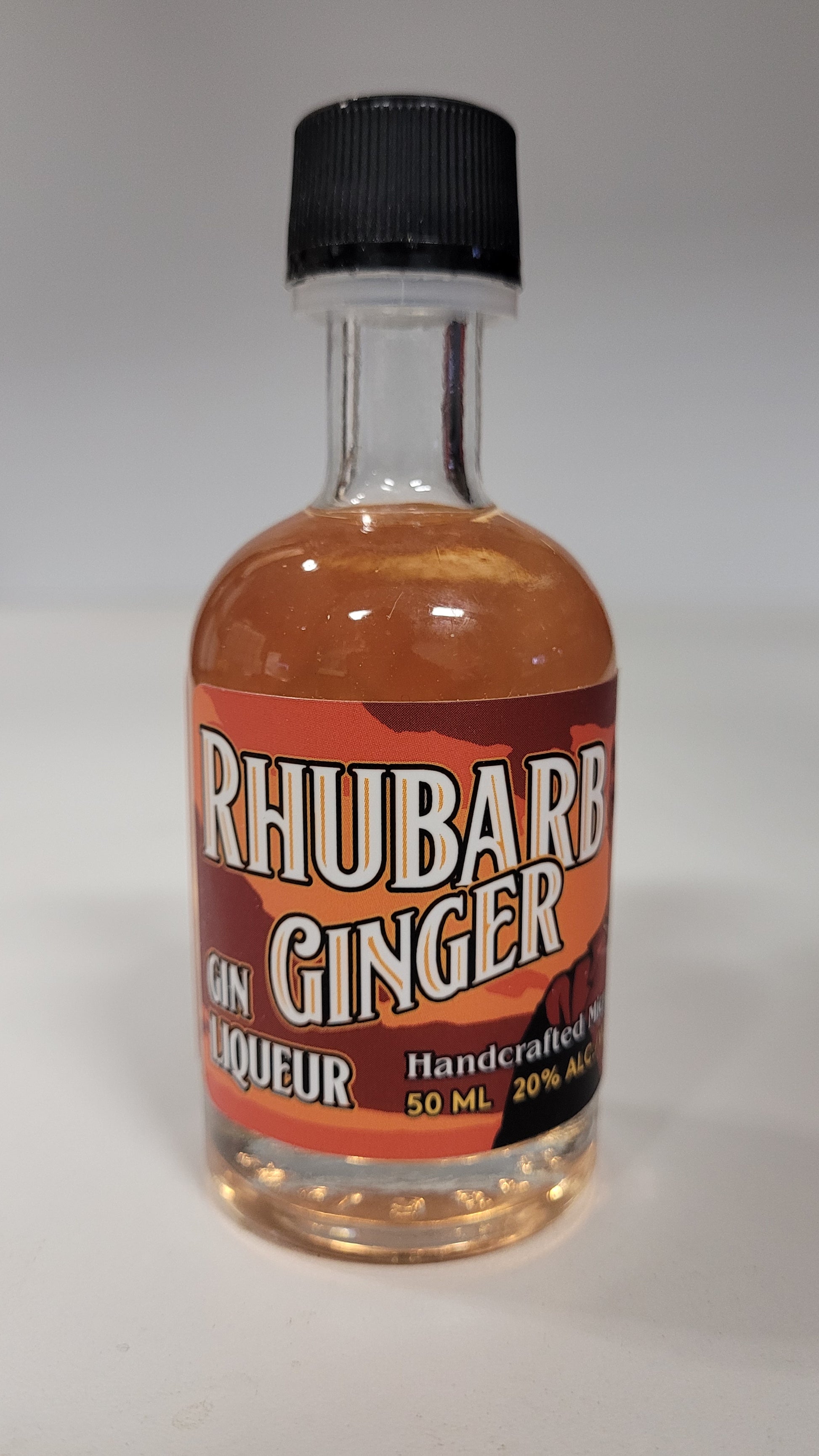 Single-serving 50ml rhubarb ginger gin liqueur.